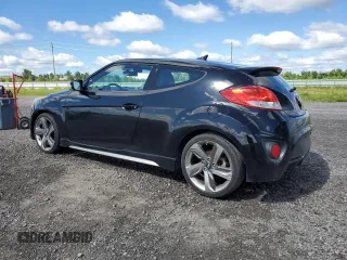 2013 Hyundai Veloster Turbo с VIN KMHTC6AE3DU134402, выставлен на аукционе Copart как лот 65343855 с пробегом 159 905 миль миль и Чистый • Clean title. История ставок и продаж доступна на DreamBid. Изображение 2.