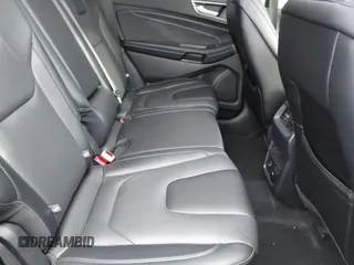 2021 Ford Edge Titanium z VIN 2FMPK4K94MBA32297, wystawiony jako IAAI lot #41834740 z przebiegiem 45 908 mil mil oraz . Historia ofert i sprzedaży dostępna na DreamBid. Obrazek 8.
