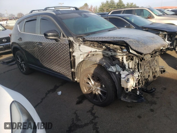 2021 Mazda CX-5 Signature with VIN JM3KFBEY2M0345187, listed as a Copart auction lot 82786984 with 98,014 mi miles and Salvage Title. Bid and sale history available at carsss.com. Image 4.
