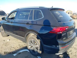 2018 Volkswagen Tiguan SEL with VIN 3VV3B7AX7JM117053, listed as a IAAI auction lot 40827695 with 71,489 mi miles and . Bid and sale history available at DreamBid. Image 3.