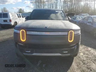 2022 Rivian R1S Launch Edition with VIN 7PDSGABL1NN000514, listed as a Copart auction lot 77444184 with 29,490 mi miles and Salvage Title. Bid and sale history available at DreamBid. Image 5.