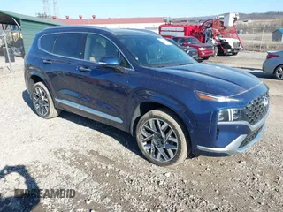 2021 Hyundai Santa Fe Calligraphy z VIN 5NMS5DAL4MH352689, wystawiony jako IAAI lot #41740911 z przebiegiem 15 589 mil mil oraz . Historia ofert i sprzedaży dostępna na DreamBid. Obrazek 1.
