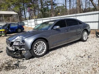 2015 Audi A8 3.0T with VIN WAU3GAFD3FN027632, listed as a Copart auction lot 49260355 with 97,076 mi miles and Salvage Title. Bid and sale history available at DreamBid. Image 1.