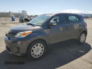 2009 Scion xD with VIN JTKKU10479J039058, listed as a Copart auction lot 63647485 with 118,956 mi miles and Salvage title. Bid and sale history available at DreamBid. Image 1.