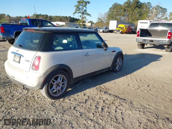 2006 MINI Hardtop with VIN WMWRC335X6TK16871, listed as a IAAI auction lot 41846929 with 145,709 mi miles and . Bid and sale history available at DreamBid. Image 4.