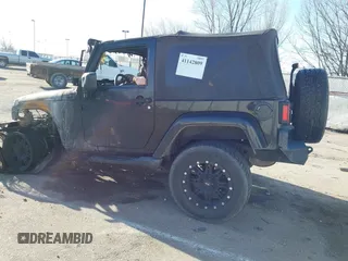 2011 Jeep Wrangler Sahara with VIN 1J4AA5D14BL514060, listed as a IAAI auction lot 41142809 with Not Provided miles and . Bid and sale history available at DreamBid. Image 3.