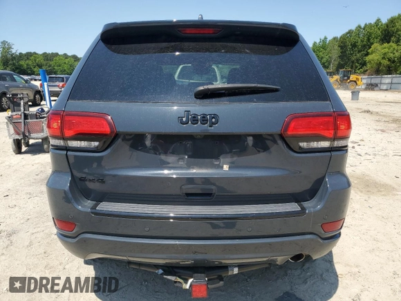 2018 Jeep Grand Cherokee Altitude with VIN 1C4RJFAGXJC267021, listed as a Copart auction lot 58762945 with 93,347 mi miles and Salvage title. Bid and sale history available at DreamBid. Image 6.