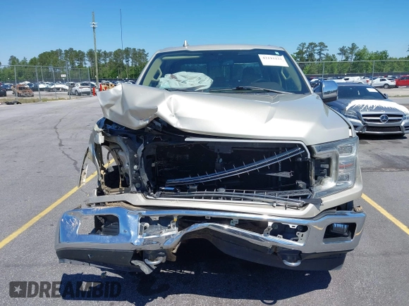 2018 Ford F-150 XL with VIN 1FTEW1E54JFE36153, listed as a IAAI auction lot 42193233 with 96,074 mi miles and . Bid and sale history available at DreamBid. Image 13.