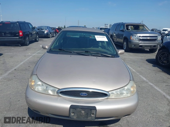 1999 Ford Contour z VIN 3FAFP66L6XM102099, wystawiony jako IAAI lot #42161889 z przebiegiem 100 340 mil mil oraz . Historia ofert i sprzedaży dostępna na DreamBid. Obrazek 12.