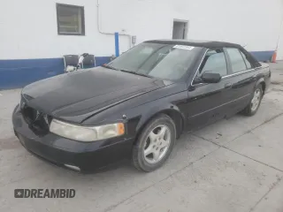 1999 Cadillac Seville Touring STS z VIN 1G6KY5490XU938206, wystawiony jako Copart lot #81562364 z przebiegiem 254 322 mil mil oraz Tytuł czysty. Historia ofert i sprzedaży dostępna na DreamBid. Obrazek 1.