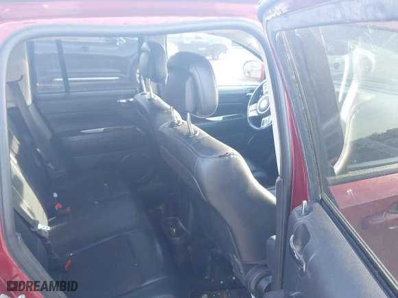 2016 Jeep Compass High Altitude Edition with VIN 1C4NJCEA9GD599487, listed as a IAAI auction lot 42087686 with 176,820 mi miles. Bid and sale history available at carsss.com. Image 8.