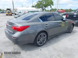 2015 Infiniti Q50 Premium with VIN JN1BV7AP8FM352195, listed as a IAAI auction lot 41968813 with 146,542 mi miles. Bid and sale history available at carsss.com. Image 4.