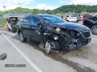 2014 Mazda CX-9 Touring with VIN JM3TB2CA9E0442202, listed as a IAAI auction lot 42292356 with 239,578 mi miles and . Bid and sale history available at DreamBid. Image 1.