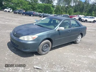 2003 Toyota Camry LE with VIN 4T1BE32K23U785060, listed as a IAAI auction lot 41825336 with 205,751 mi miles and . Bid and sale history available at DreamBid. Image 2.