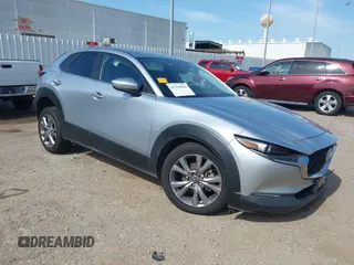 2021 Mazda CX-30 Select with VIN 3MVDMABL8MM273045, listed as a IAAI auction lot 42258604 with 47,805 mi miles and . Bid and sale history available at DreamBid. Image 1.