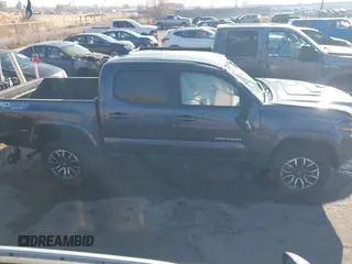 2023 Toyota Tacoma SR with VIN 3TMCZ5AN2PM553928, listed as a IAAI auction lot 40999044 with 9,210 mi miles and . Bid and sale history available at DreamBid. Image 13.