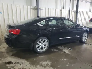 2014 Chevrolet Impala LTZ with VIN 2G1155S31E9275036, listed as a Copart auction lot 52099875 with 87,719 mi miles and Salvage title. Bid and sale history available at DreamBid. Image 3.