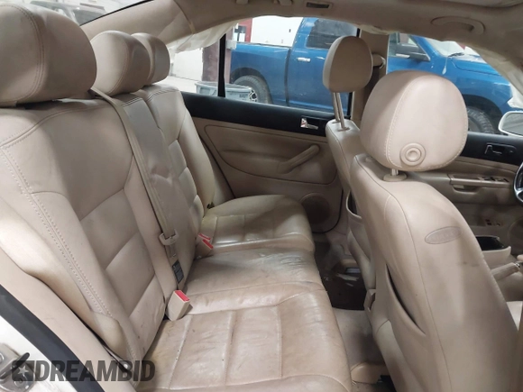 2004 Volkswagen Jetta GLS z VIN 3VWSK69MX4M078023, wystawiony jako IAAI lot #41198138 z przebiegiem 153 830 mil mil oraz . Historia ofert i sprzedaży dostępna na DreamBid. Obrazek 8.
