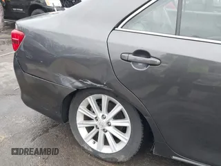 2012 Toyota Camry XLE z VIN 4T1BD1FK1CU048272, wystawiony jako IAAI lot #41711586 z przebiegiem 104 734 mil mil oraz . Historia ofert i sprzedaży dostępna na DreamBid. Obrazek 6.