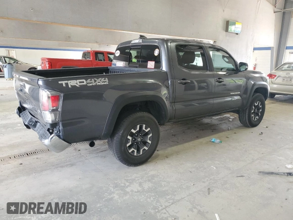 2021 Toyota Tacoma SR with VIN 3TMCZ5ANXMM425903, listed as a Copart auction lot 57963425 with 61,458 mi miles and Salvage title. Bid and sale history available at DreamBid. Image 3.