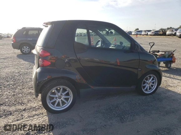 2008 Smart fortwo Pure with VIN WMEEJ31X68K141107, listed as a Copart auction lot 61967365 with Not provided miles and Clean title. Bid and sale history available at DreamBid. Image 3.