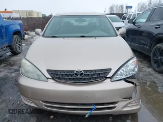 2002 Toyota Camry XLE z VIN 4T1BF32K42U533788, wystawiony jako IAAI lot #42024918 z przebiegiem 120 168 mil mil oraz . Historia ofert i sprzedaży dostępna na DreamBid. Obrazek 12.