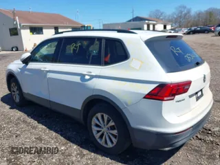 2018 Volkswagen Tiguan S z VIN 3VV1B7AX5JM043090, wystawiony jako IAAI lot #41998165 z przebiegiem Nie podano mil oraz . Historia ofert i sprzedaży dostępna na DreamBid. Obrazek 13.