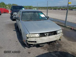 1995 Nissan Altima XE with VIN 1N4BU31D5SC101493, listed as a IAAI auction lot 41913245 with 224,199 mi miles. Bid and sale history available at carsss.com. Image 6.
