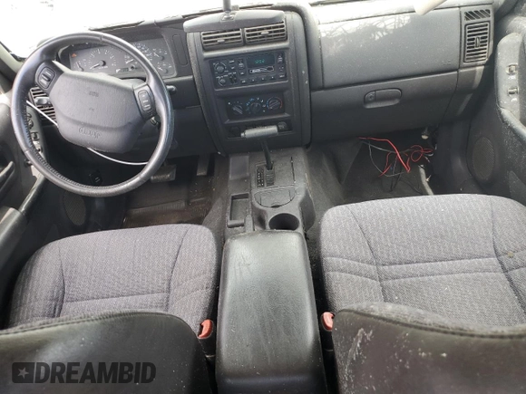 2001 Jeep Cherokee Sport с VIN 1J4FT48S21L607090, выставлен на аукционе Copart как лот 50123995 с пробегом 146 120 миль миль и Списание • Salvage title. История ставок и продаж доступна на DreamBid. Изображение 8.