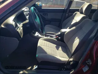 2002 Subaru Legacy L with VIN 4S3BH635X27304636, listed as a Copart auction lot 77674424 with 159,785 mi miles and Salvage title. Bid and sale history available at DreamBid. Image 7.