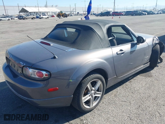 2006 Mazda MX-5 Miata Touring z VIN JM1NC25F960112536, wystawiony jako IAAI lot #41868290 z przebiegiem 153 162 mil mil oraz . Historia ofert i sprzedaży dostępna na DreamBid. Obrazek 4.