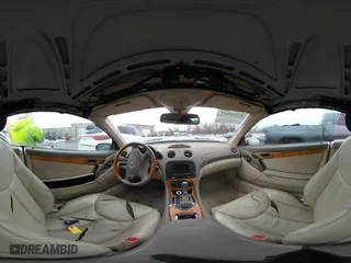 2005 Mercedes-Benz SL-Class 5.0L with VIN WDBSK75F35F099084, listed as a IAAI auction lot 41715942 with 114,880 mi miles. Bid and sale history available at carsss.com. Image 18.