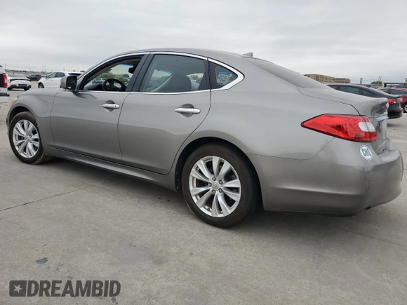 2011 Infiniti M37 with VIN JN1BY1AP8BM320930, listed as a Copart auction lot 79931304 with 102,070 mi miles and Salvage Title. Bid and sale history available at carsss.com. Image 2.