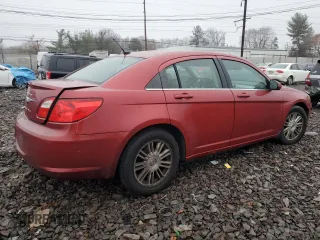 2009 Chrysler Sebring Touring *Ltd Avail* with VIN 1C3LC56B59N537686, listed as a Copart auction lot 84231154 with 144,333 mi miles and Salvage Title. Bid and sale history available at carsss.com. Image 3.