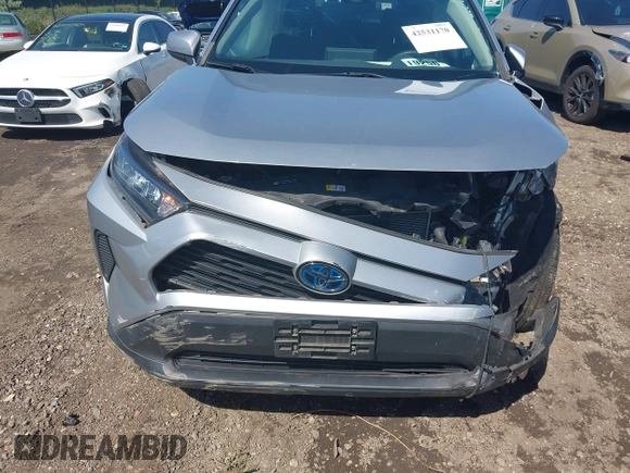 2019 Toyota RAV4 Hybrid LE with VIN 2T3MWRFVXKW031519, listed as a IAAI auction lot 42531170 with 68,160 mi miles and . Bid and sale history available at DreamBid. Image 12.