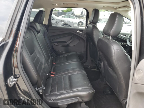 2018 Ford Escape Titanium with VIN 1FMCU0J92JUC84901, listed as a Copart auction lot 60428635 with 69,210 mi miles and Salvage title. Bid and sale history available at DreamBid. Image 11.