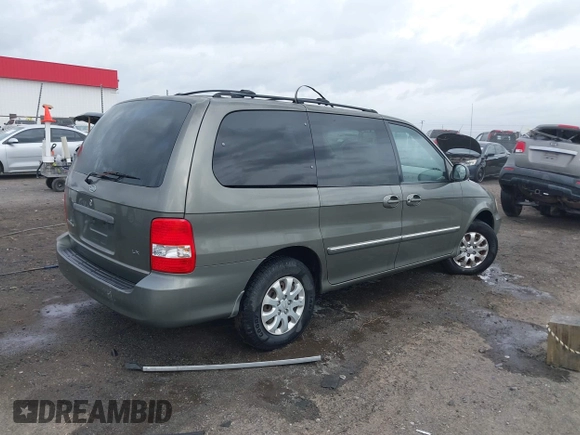 2005 Kia Sedona LX with VIN KNDUP132656734193, listed as a IAAI auction lot 41892342 with 91,768 mi miles. Bid and sale history available at carsss.com. Image 4.