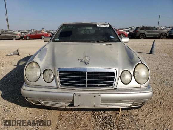1998 Mercedes-Benz E-Class with VIN WDBJF65F1WA711193, listed as a Copart auction lot 76052034 with 168,935 mi miles and Salvage Title. Bid and sale history available at carsss.com. Image 5.