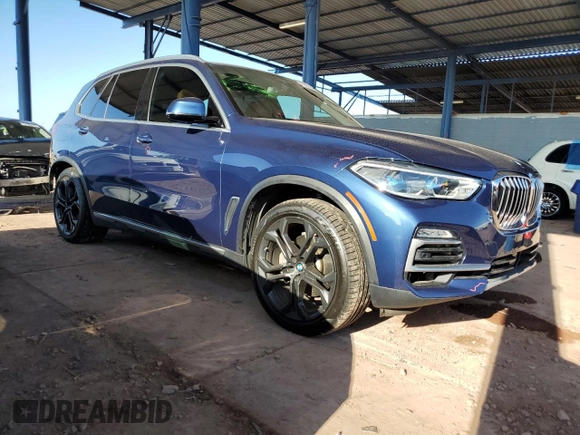 2019 BMW X5 xDrive40i with VIN 5UXCR6C5XKLL07933, listed as a Copart auction lot 59389395 with 87,251 mi miles and Salvage title. Bid and sale history available at DreamBid. Image 4.