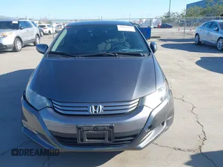 2010 Honda Insight LX with VIN JHMZE2H50AS019740, listed as a IAAI auction lot 41665527 with 74,022 mi miles and . Bid and sale history available at DreamBid. Image 12.