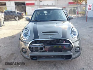 2020 MINI Hardtop Cooper S z VIN WMWXR5C00L2M23924, wystawiony jako IAAI lot #41520706 z przebiegiem 123 006 mil mil oraz . Historia ofert i sprzedaży dostępna na DreamBid. Obrazek 6.