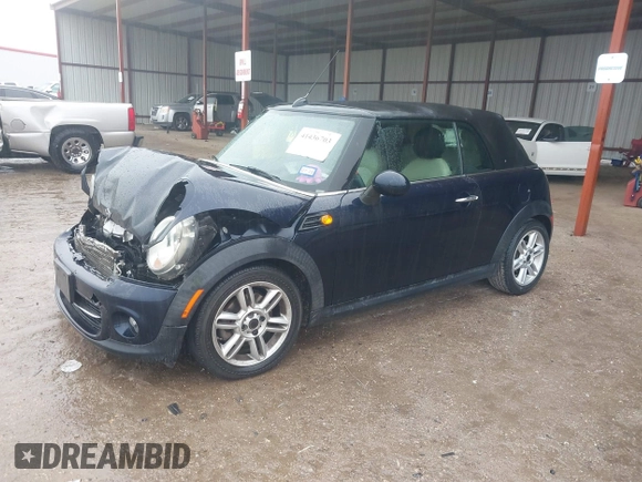 2013 MINI Convertible with VIN WMWZN3C53DT135492, listed as a IAAI auction lot 41436703 with 79,408 mi miles and . Bid and sale history available at DreamBid. Image 2.