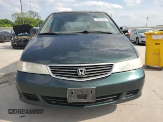 2000 Honda Odyssey LX z VIN 2HKRL1850YH575430, wystawiony jako Copart lot #53260255 z przebiegiem 188 847 mil mil oraz Szkoda całkowita • Salvage title. Historia ofert i sprzedaży dostępna na DreamBid. Obrazek 5.