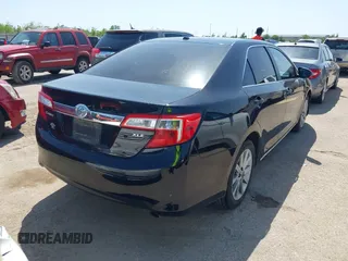 2014 Toyota Camry L with VIN 4T4BF1FK3ER413537, listed as a IAAI auction lot 42015577 with 181,592 mi miles. Bid and sale history available at carsss.com. Image 4.