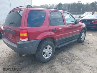 2003 Ford Escape XLT Popular with VIN 1FMYU03183KA25020, listed as a IAAI auction lot 41519021 with 179,737 mi miles. Bid and sale history available at carsss.com. Image 4.