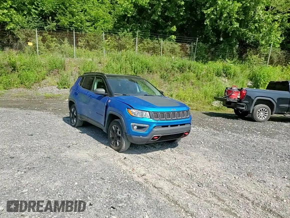 2018 Jeep Compass Trailhawk with VIN 3C4NJDDB7JT179423, listed as a Copart auction lot 61458605 with 100,949 mi miles and Salvage title. Bid and sale history available at DreamBid. Image 14.