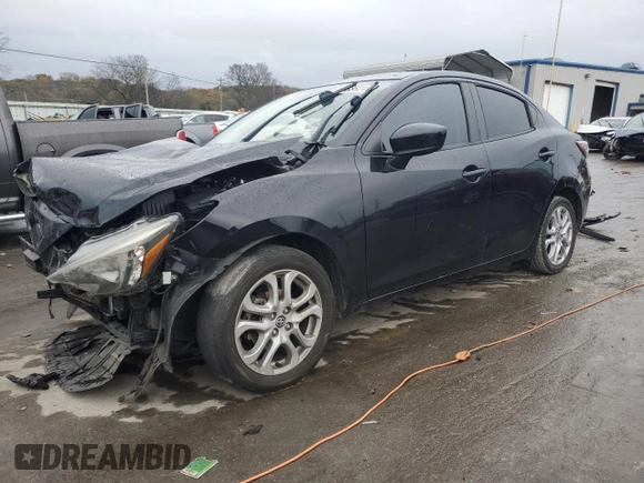 2016 Scion iA z VIN 3MYDLBZV9GY129875, wystawiony jako Copart lot #81368604 z przebiegiem 82 111 mil mil oraz Szkody całkowita. Historia ofert i sprzedaży dostępna na DreamBid. Obrazek 1.