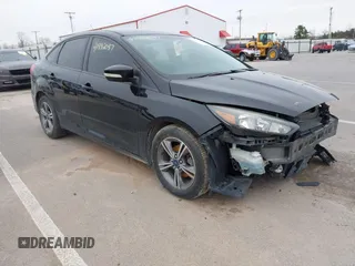 2017 Ford Focus SE with VIN 1FADP3FE4HL307110, listed as a IAAI auction lot 41992037 with 54,380 mi miles and . Bid and sale history available at DreamBid. Image 1.
