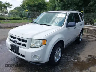 2009 Ford Escape Hybrid with VIN 1FMCU49359KA49066, listed as a IAAI auction lot 42419259 with 199,722 mi miles and . Bid and sale history available at DreamBid. Image 2.