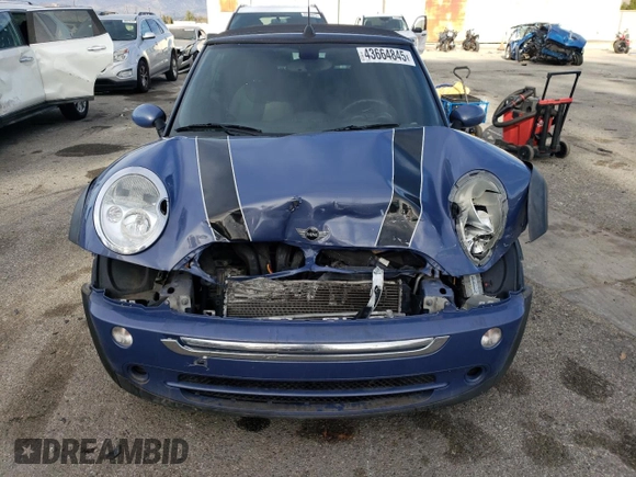 2007 MINI Convertible with VIN WMWRF33537TF66807, listed as a Copart auction lot 43664845 with 91,079 mi miles and Salvage Title. Bid and sale history available at DreamBid. Image 5.